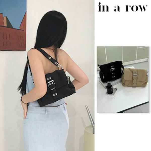 【in a row】Flap eyelet belt bag