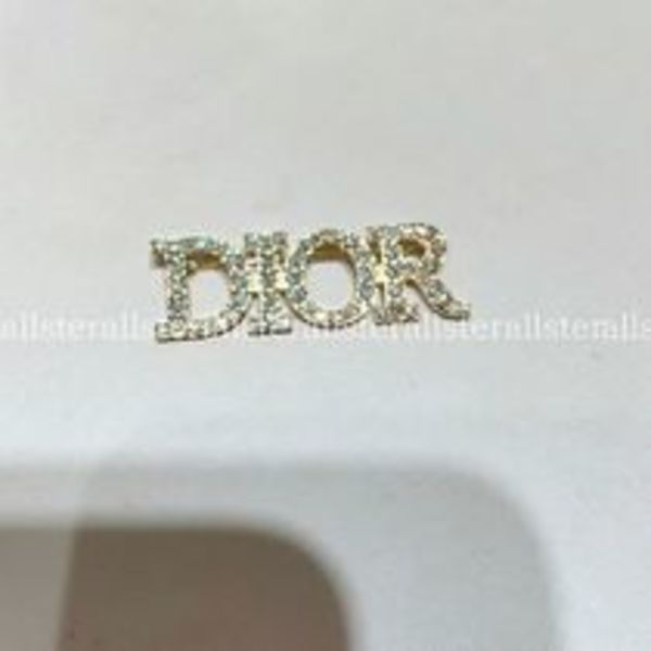 【DIOR】DIO(R)EVOLUTION ラインストーン ロゴ ブローチ