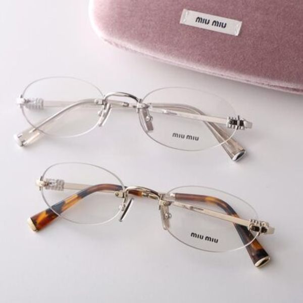 MIUMIU メガネ VMU 53W オーバル型 リムレス