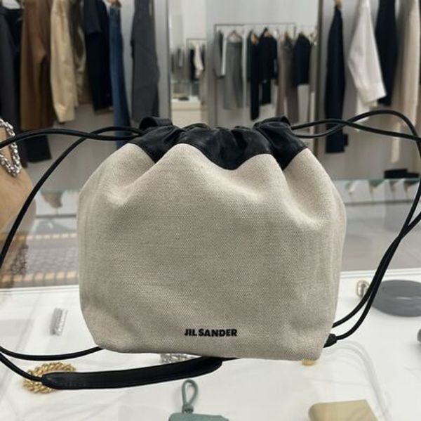 Dumpling Drawstring Bag アイボリー ショルダーバッグ