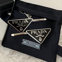 PRADA(プラダ)のモードな「ヘアアクセサリー」にファッショニスタが夢中♡
