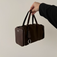 【購入レビュー】10万円台で叶うPRADA新作の折りたためる「ミニダッフル」の魅力を徹底解説!-収納力・サイズ感をご紹介