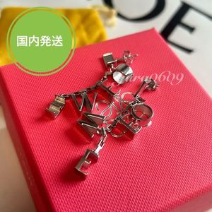 ロエベ ロングピアス ライズドレター