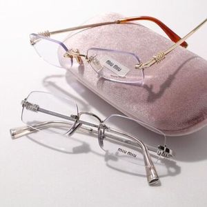 MIUMIU メガネ VMU 50Y スクエア型 リムレス