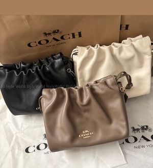 国内発送・すぐ届く【COACH】フェイ ドローストリング バッグ